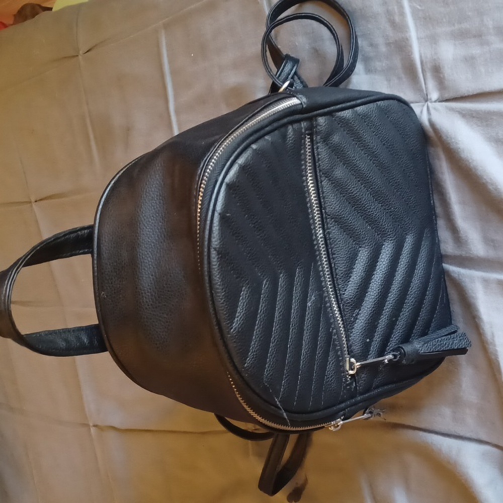 Claire's black mini backpack
